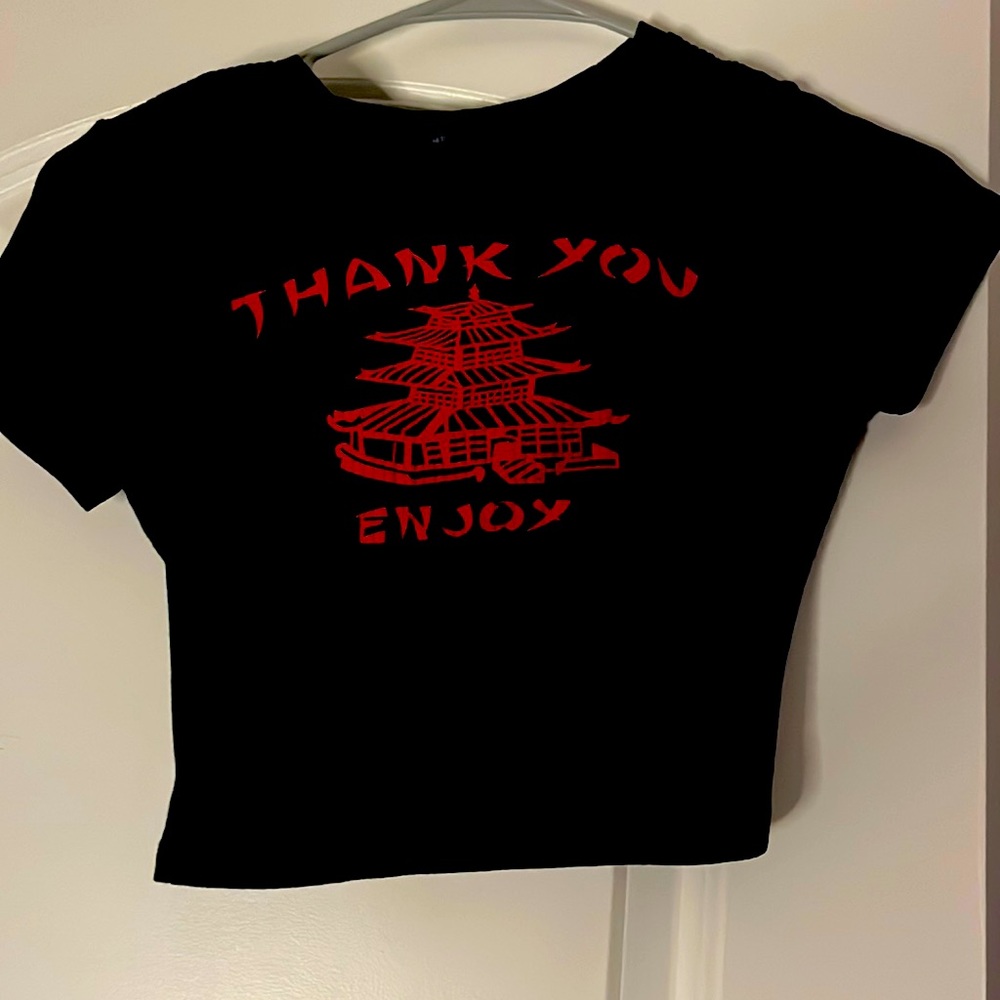 It’s a small cropped black and red thank you enjoy top size medium